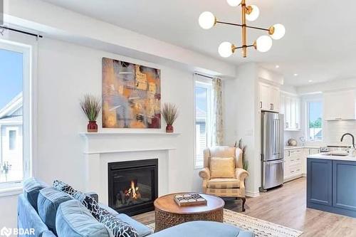 17 Chambery Street, Bracebridge, ON - Indoor Photo Showing Living Room With Fireplace