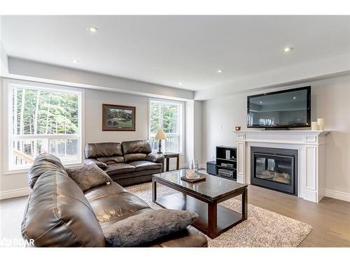 61 Quinn Forest Drive, Bracebridge, ON - Indoor Photo Showing Living Room With Fireplace