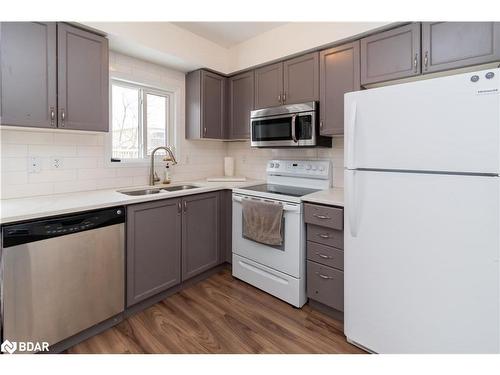 13 Truax Crescent, Essa, ON - Indoor Photo Showing Kitchen With Double Sink