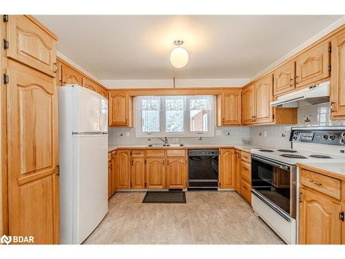 13 Davis Street, South River, ON - Indoor Photo Showing Kitchen With Double Sink