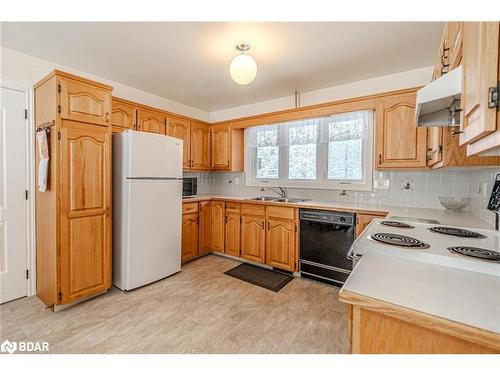 13 Davis Street, South River, ON - Indoor Photo Showing Kitchen With Double Sink