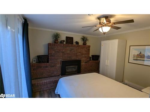 243 Lillian Crescent, Barrie, ON - Indoor Photo Showing Bedroom With Fireplace