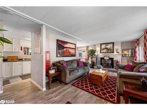 15 Maple Court, Innisfil, ON - Indoor Photo Showing Living Room With Fireplace