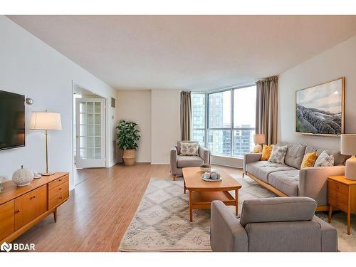 908-140 Dunlop Street E, Barrie, ON - Indoor Photo Showing Living Room