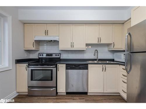 4-35 Madelaine Drive, Barrie, ON - Indoor Photo Showing Kitchen With Double Sink