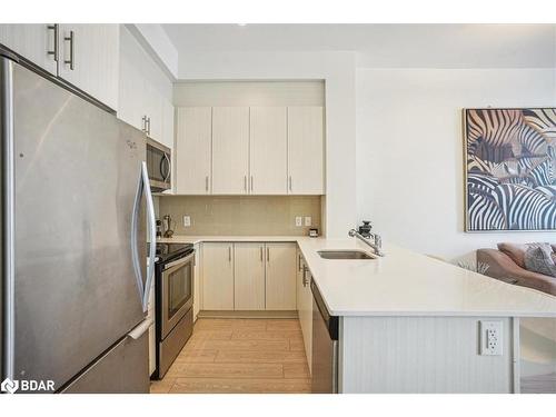 Ph-02-111 Worsley Street, Barrie, ON - Indoor Photo Showing Kitchen With Stainless Steel Kitchen