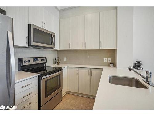 Ph-02-111 Worsley Street, Barrie, ON - Indoor Photo Showing Kitchen With Stainless Steel Kitchen