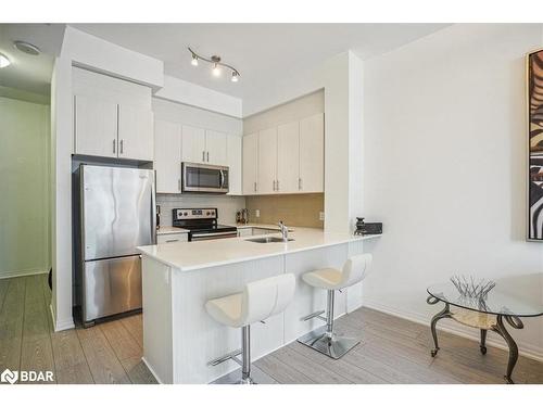 Ph-02-111 Worsley Street, Barrie, ON - Indoor Photo Showing Kitchen With Stainless Steel Kitchen