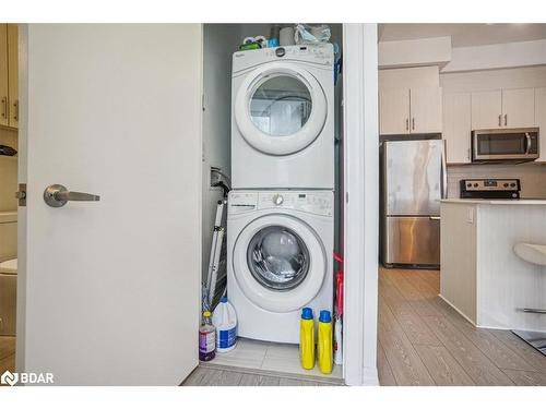 Ph-02-111 Worsley Street, Barrie, ON - Indoor Photo Showing Laundry Room