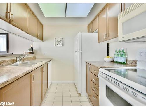 1201-75 Ellen Street, Barrie, ON - Indoor Photo Showing Kitchen With Double Sink