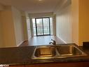 103-496 Yonge Street, Barrie, ON  - Indoor Photo Showing Kitchen With Double Sink 