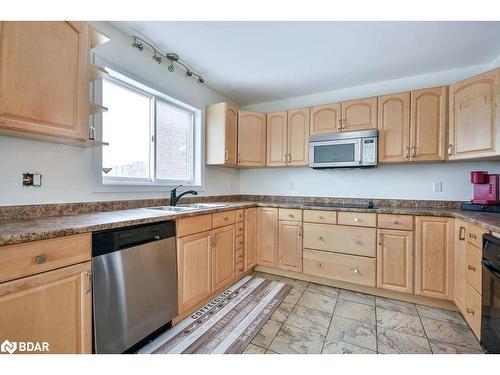 33 Brown Wood Drive, Barrie, ON - Indoor Photo Showing Kitchen With Double Sink