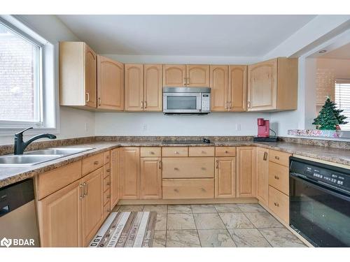 33 Brown Wood Drive, Barrie, ON - Indoor Photo Showing Kitchen With Double Sink