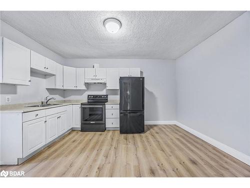 66 Matchedash Street S, Orillia, ON - Indoor Photo Showing Kitchen With Double Sink