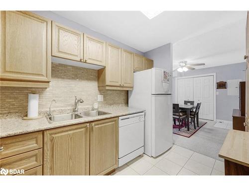 109-500 Mapleview Drive W, Barrie, ON - Indoor Photo Showing Kitchen With Double Sink