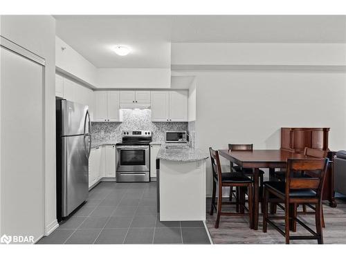 208-306 Essa Road, Barrie, ON - Indoor Photo Showing Kitchen With Stainless Steel Kitchen