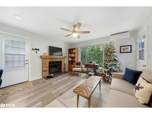 125-27 Dawson Drive, Collingwood, ON - Indoor Photo Showing Living Room With Fireplace