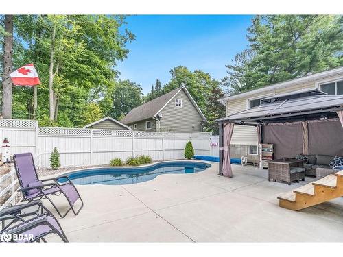 328 Peek-A-Boo Trail, Tiny, ON - Outdoor With In Ground Pool With Deck Patio Veranda