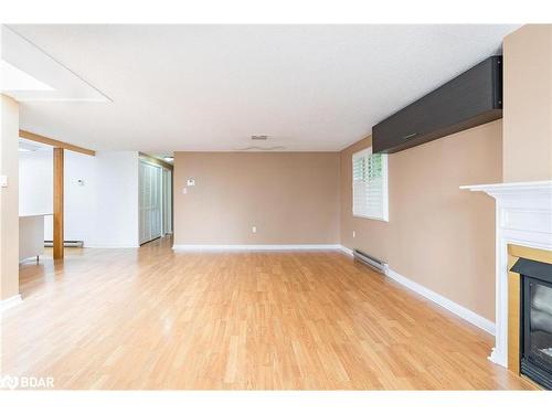 9 Coles Street, Barrie, ON - Indoor Photo Showing Other Room With Fireplace