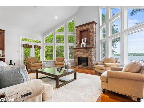 2240 South Orr Lake Road, Elmvale, ON - Indoor Photo Showing Living Room With Fireplace