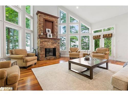 2240 South Orr Lake Road, Elmvale, ON - Indoor Photo Showing Living Room With Fireplace