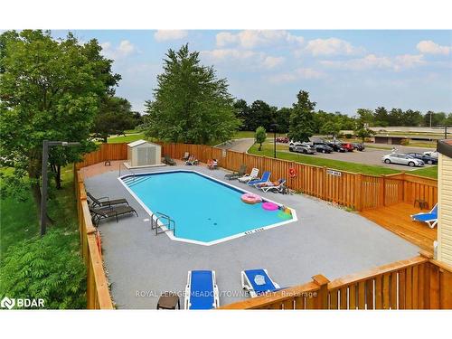 604-6720 Glen Erin Drive, Mississauga, ON - Outdoor With In Ground Pool