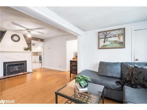 55 River Avenue Crescent, Wasaga Beach, ON - Indoor Photo Showing Living Room With Fireplace