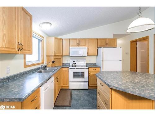 2 St James Place, Wasaga Beach, ON - Indoor Photo Showing Kitchen With Double Sink