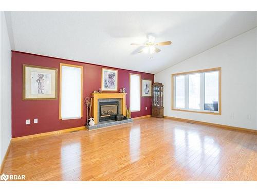 2 St James Place, Wasaga Beach, ON - Indoor Photo Showing Living Room With Fireplace