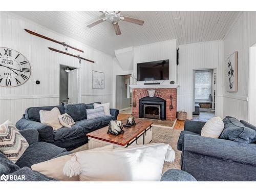 6568 Quarry Point Road, Ramara, ON - Indoor Photo Showing Living Room With Fireplace