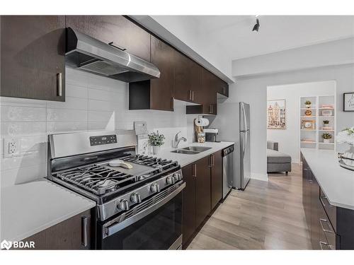 208-5 Chef Lane, Barrie, ON - Indoor Photo Showing Kitchen With Double Sink