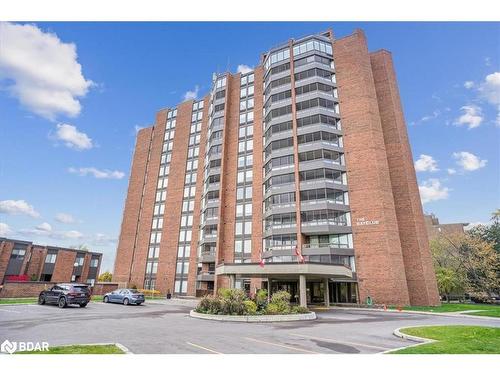 106-181 Collier Street, Barrie, ON - Outdoor With Balcony With Facade