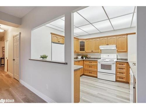 106-181 Collier Street, Barrie, ON - Indoor Photo Showing Kitchen