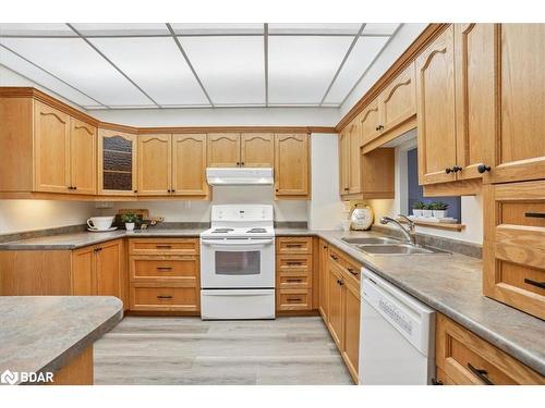 106-181 Collier Street, Barrie, ON - Indoor Photo Showing Kitchen With Double Sink