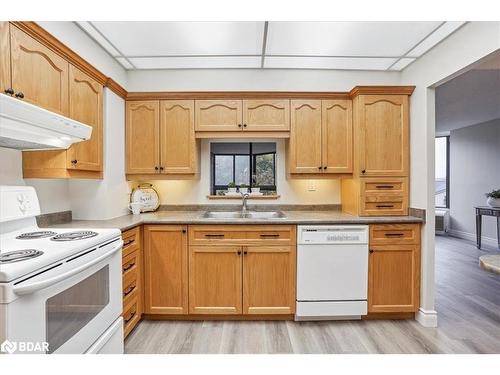 106-181 Collier Street, Barrie, ON - Indoor Photo Showing Kitchen With Double Sink