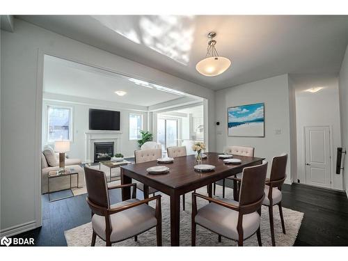 713 Mika Street, Innisfil, ON - Indoor Photo Showing Dining Room With Fireplace