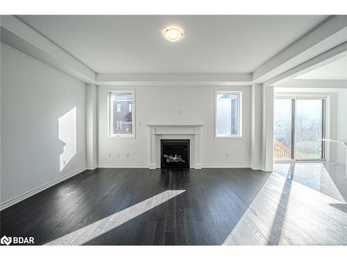 713 Mika Street, Innisfil, ON - Indoor Photo Showing Living Room With Fireplace