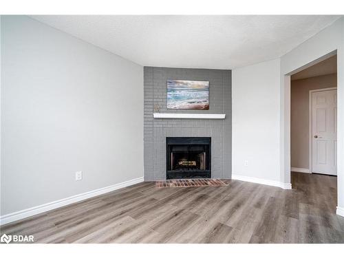 9 Penton Drive, Barrie, ON - Indoor Photo Showing Living Room With Fireplace