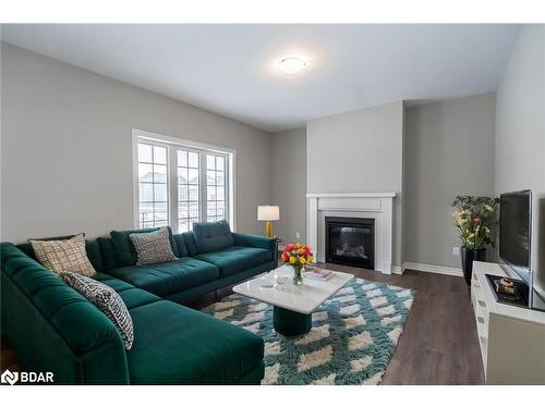 240 Springfield Cres, Stayner, ON - Indoor Photo Showing Living Room With Fireplace