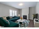 240 Springfield Cres, Stayner, ON  - Indoor Photo Showing Living Room With Fireplace 