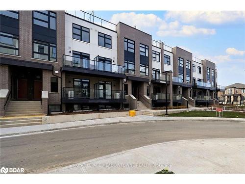 108-1565 Rose Way, Milton, ON - Outdoor With Balcony With Facade