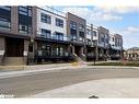 108-1565 Rose Way, Milton, ON  - Outdoor With Balcony With Facade 