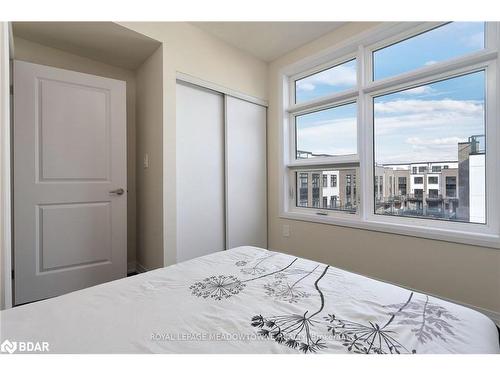 108-1565 Rose Way, Milton, ON - Indoor Photo Showing Bedroom