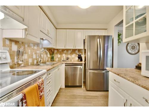 8-30 Loggers Run, Barrie, ON - Indoor Photo Showing Kitchen With Double Sink