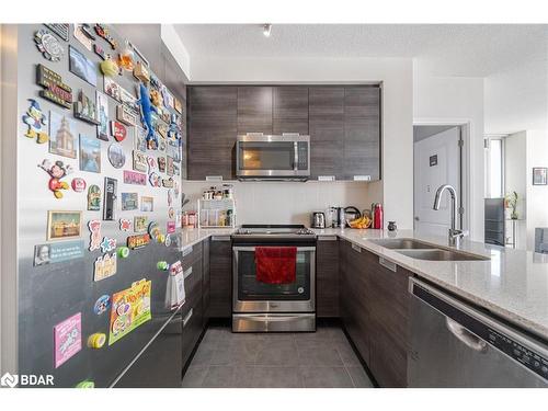 1212-5033 Four Springs Avenue, Mississauga, ON - Indoor Photo Showing Kitchen With Double Sink