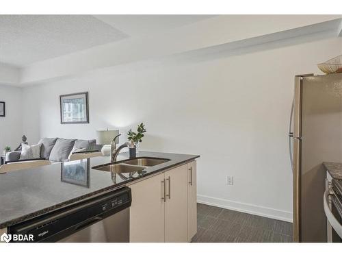 213-4 Spice Way, Barrie, ON - Indoor Photo Showing Kitchen With Double Sink