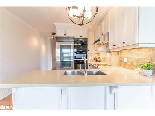 604-80 Orchard Point Road, Orillia, ON - Indoor Photo Showing Kitchen With Double Sink