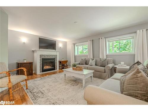 2994 Wasdell Falls Road, Washago, ON - Indoor Photo Showing Living Room With Fireplace