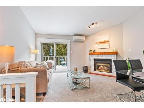 403-12 Dawson Drive, Collingwood, ON - Indoor Photo Showing Living Room With Fireplace