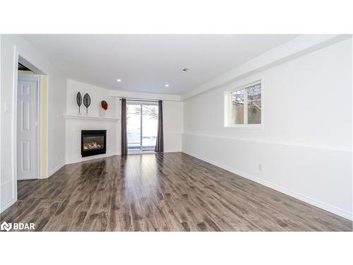 94 Churchland Drive, Barrie, ON - Indoor Photo Showing Living Room With Fireplace